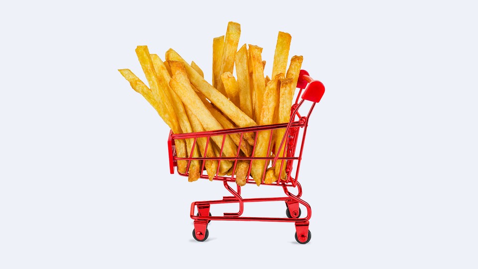 Illustration of a tiny red shopping cart full of french fries