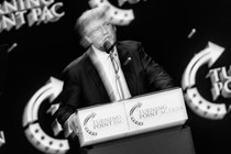 Black-and-white photo of Trump speaking