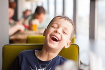 A kid laughing