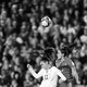 Photo of a U.S. and Portuguese player contesting a soccer ball
