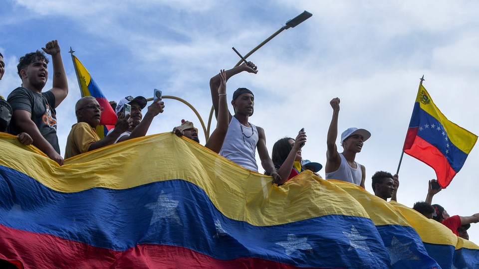 Protesters demonstrate against the official election results declaring President Nicolás Maduro’s reelection in Valencia, Venezuela, on Monday, July 29, 2024, the day after the vote.