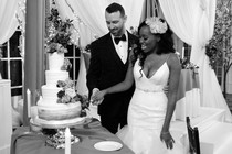 Lauren and Cameron cut the cake during their wedding on Season 1 of "Love Is Blind"