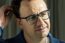 A color portrait of Dario Amodei