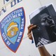 A picture of Kalief Browder in front of a building on Riker's Island