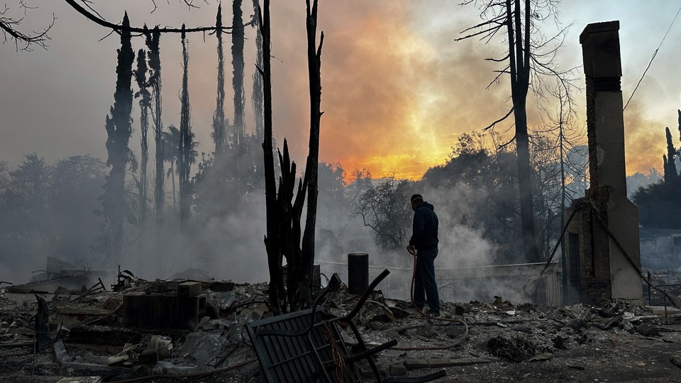 A photo of a smoldering L.A. neighborhood