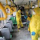 Workers sanitizing a bus in Ukraine.