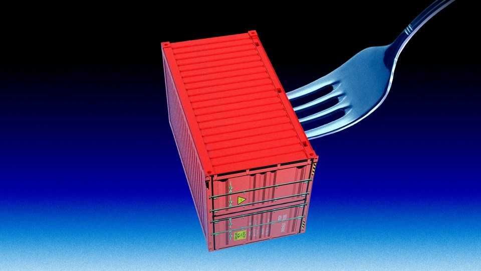 A giant fork impaling a shipping container