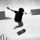 Skateboarder Miyu Sasaki performs a trick at an Olympics venue.