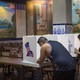 Two Latinos voting