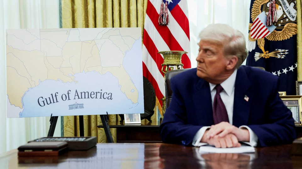 Photo of Donald Trump looking at a map of the “Gulf of America”