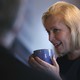 Senator Kirsten Gillibrand holding a cup of coffee