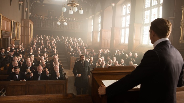 Percy Fawcett (Charlie Hunnam) speaks to the Royal Geographical Society in 'The Lost City of Z.'