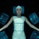 Millie Bobby Brown as Eleven lying with eyes closed, wearing a white body suit