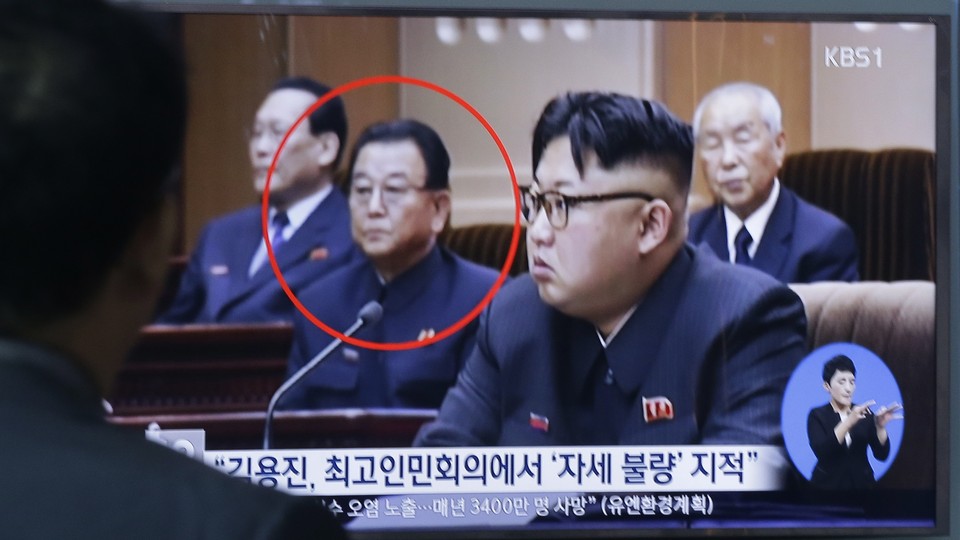 Kim Yong-jin, the vice premier on education affairs, and North Korean leader Kim Jong-un