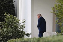 Donald Trump walks away from the camera