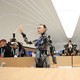 Photograph of humanoid robots working at an information desk at China's Zhongguancun International Innovation Center