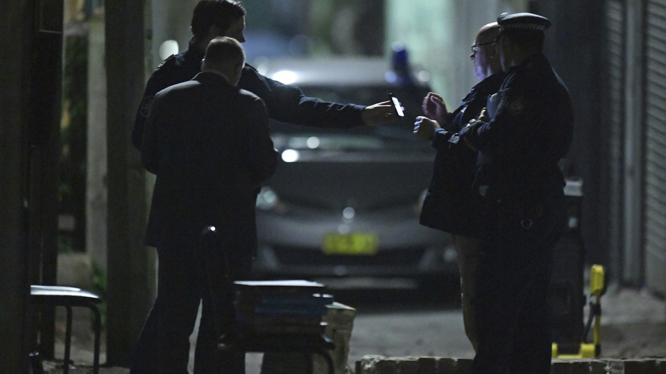 Australian Federal Police and NSW Police officers work in the Surry Hills suburb of Sydney, Australia on Saturday, July 29, 2017.