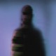 Image of a shadowy, blurry figure