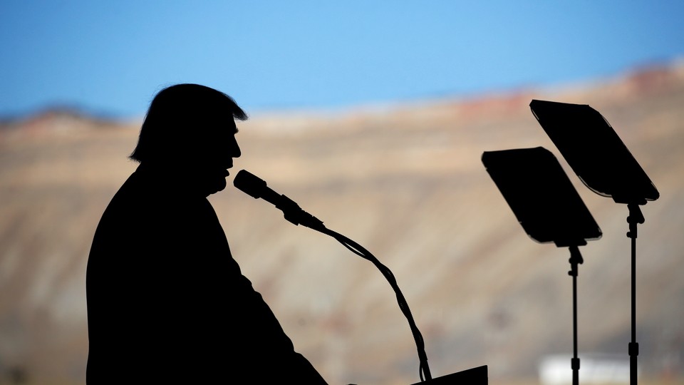 The silhouette of President Donald Trump