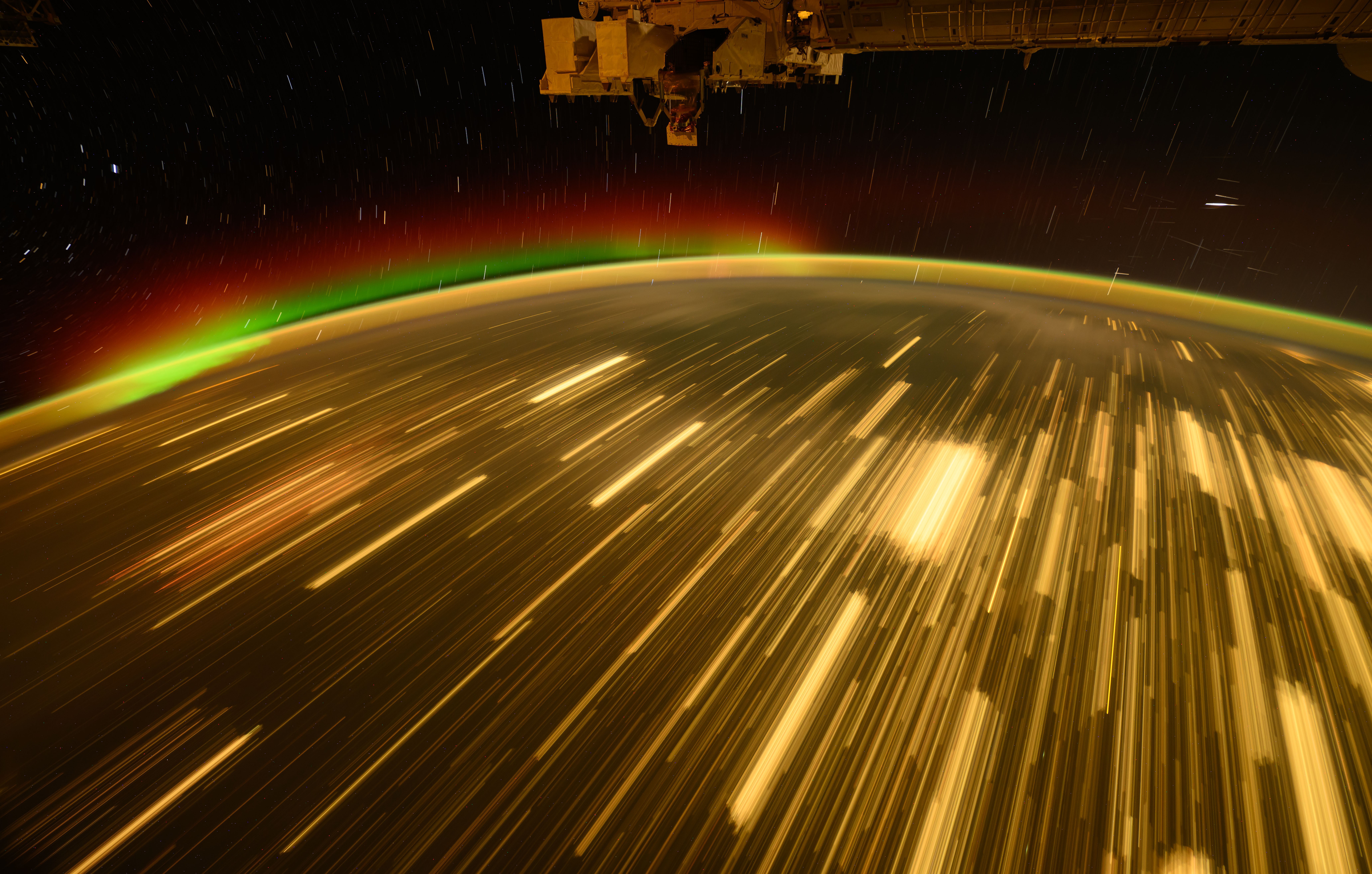 Lights streak past, seen in a long-exposure image as the ISS passes over the American Midwest.