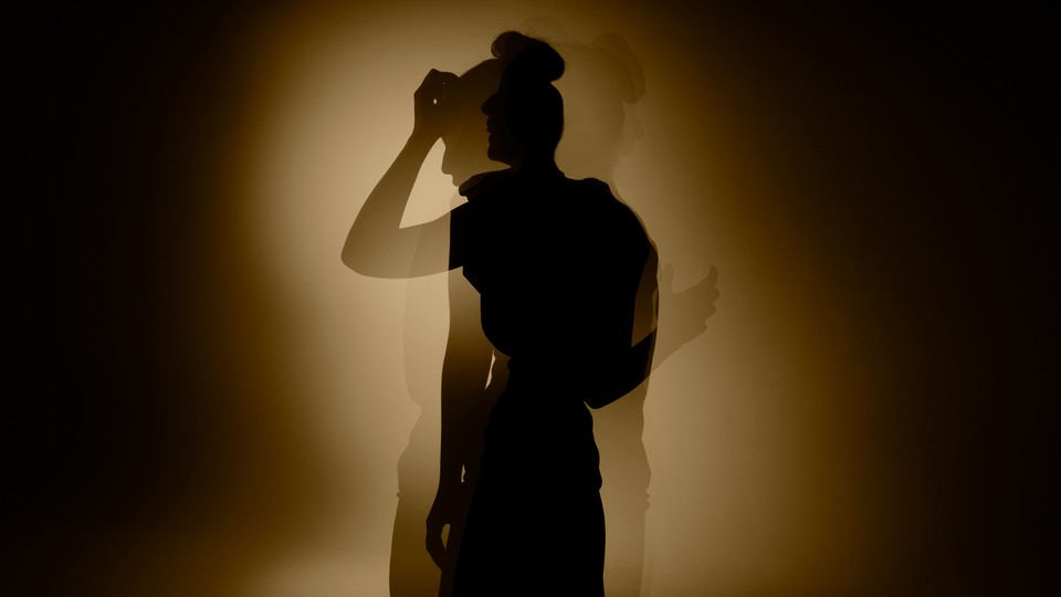 An image of a girl's silhouette in shadows