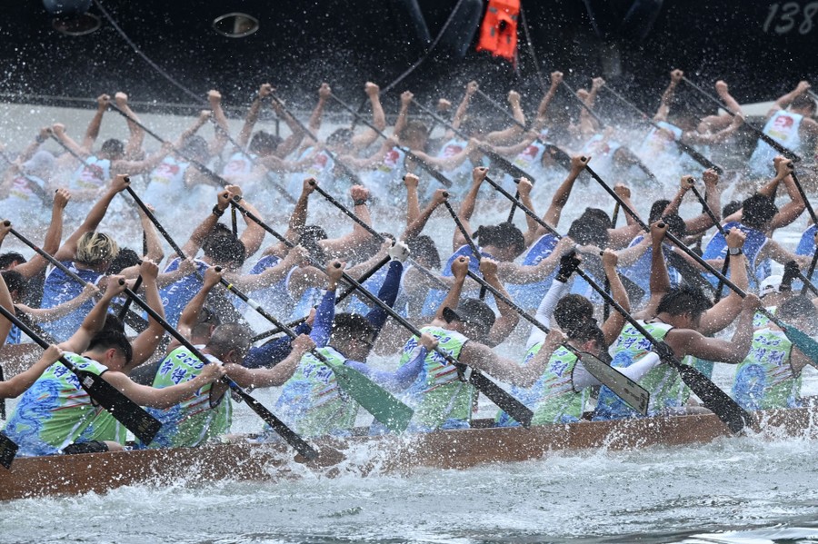 Photos of the Week Mormon Crickets, Dragon Boats, Floating Concert