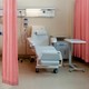 Two empty patient seats in a hospital