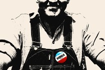 A white man wearing a Kamala Harris sticker on his overalls