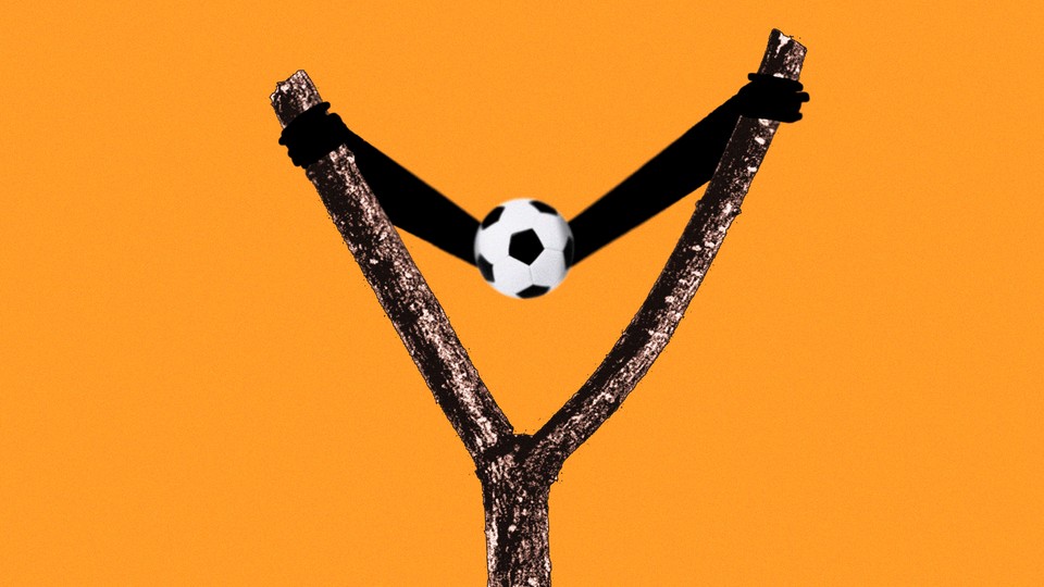 A slingshot with a soccer ball