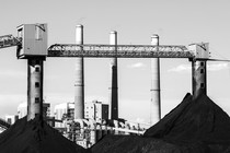 Large coal piles sit in front of PacifiCorps, a power plant in Castle Dale, Utah, in June 2019