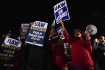 People holding UAW signs