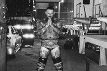 A black and white photograph of Brody King at night after a fight