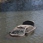 An abandoned vehicle floats in flood water after a rainstorm in Dubai, United Arab Emirates.