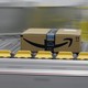 An Amazon Prime package on a conveyor belt