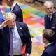 Boris Johnson salutes his fellow EU leaders.