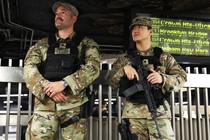 A photo of National Guard officers in the New York City subway
