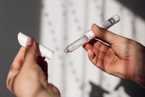Semaglutide injection pen or cartridge pen for diabetics and weight loss in female hand.