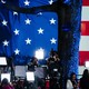 Members of the media work during an Election Night campaign watch party for Democratic presidential nominee Vice President Kamala Harris on Tuesday, Nov. 5, 2024, on the campus of Howard University, in Washington.