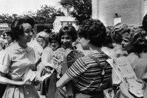 Girls chatting outside a school