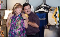 Jack Black and Shirley MacLaine looking at dresses