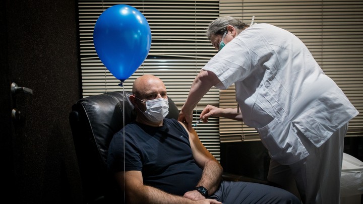 A man getting vaccinated
