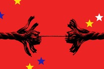 A fraying rope that has split in two is shown on a field of red with scattered blue, yellow, and white stars.