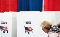 A photograph of an American voting