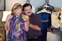 Jack Black and Shirley MacLaine looking at dresses