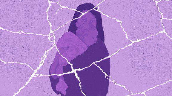 A cracked image of a woman holding a child and staring intently