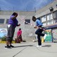 An inmate plays jump rope with her 10-year-old daughter and cousin at the Folsom Women's Facility in Folsom, California.