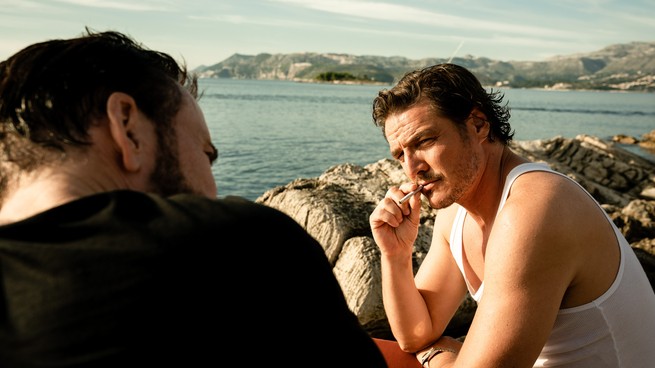 Pedro Pascal and Nic Cage by the water