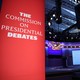 Sign to the right of a debate stage that says "The Commission on Presidential Debates"