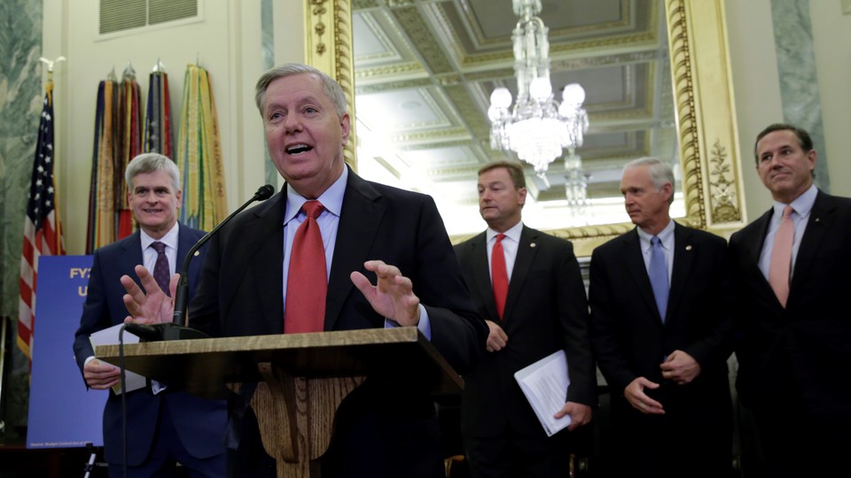 Senator Lindsey Graham leads a group of Republicans introducing an Obamacare-repeal plan.