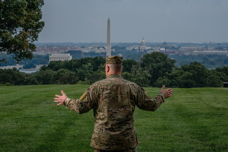 Mark Milley facing the Washington D.C. skyline